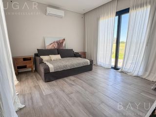 Foto 14 de Venta Casa - Barrio El Millord / Pilara - Vista a cancha de polo