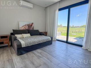 Foto 33 de Venta Casa - Barrio El Millord / Pilara - Vista a cancha de polo