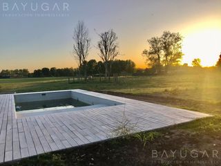 Foto 34 de Venta Casa - Barrio El Millord / Pilara - Vista a cancha de polo