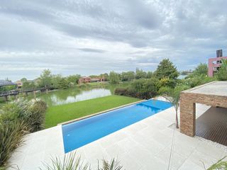 Foto 6 de Casa en alquiler anual en Santa Barbara, con 4 dormitorios a la laguna