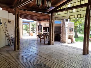 Foto 16 de Venta Casa 3 dormitorios con amplio parque - Roldan