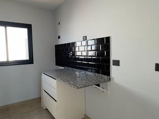 Foto 4 de Casa en Colinas de Manantiales  2 Dormitorios con cochera y parrilla en patio