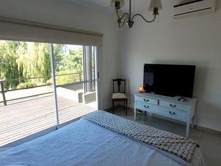 Foto 26 de San Marco | Venta | Cálida casa moderna en excelente lote al río