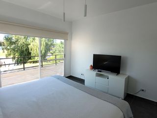Foto 24 de San Marco | Venta | Cálida casa moderna en excelente lote al río
