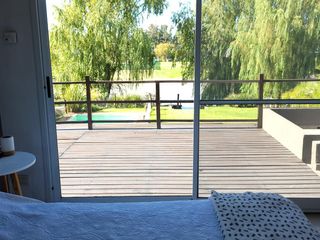 Foto 27 de San Marco | Venta | Cálida casa moderna en excelente lote al río