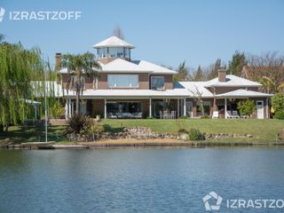 Gran casa en venta y alquiler anual a la laguna central