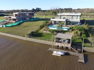 Foto 68 de Excelente casa moderna en Albanueva, como nueva, gran calidad, pileta, amarra frente al rio