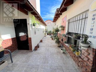 Casa venta Cipolletti, barrio San Lorenzo, 3 dormitorios, 3 baños, quincho-garaje y patio