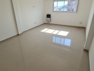 Foto 1 de MONOAMBIENTE CON TERRAZA DE USO COMÚN EN TAPIALES