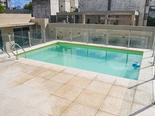 venta departamento de 3 dormitorios con balcón, cochera y amenities en Moreno al 800  zona Centro