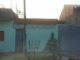 Foto 2 de Propiedad con locales