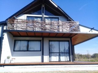 Foto 3 de HERMOSA CASA QUINTA EN VENTA CERCA DEL RIO DE LA PLATA, ACEPTA PERMUTA, AV SAN MARTIN 100 -PUNTA INDIO-