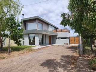 Foto 1 de VENTA nueva tasacion Casa en barrio Solanas 3 dormitorios 2 baños y construccion en el fondo