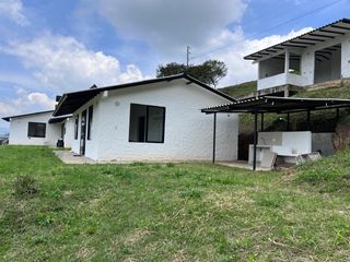 VENDO  EN PARCELACION BOSQUES DE CALIMA LOTE CON 3 CASAS