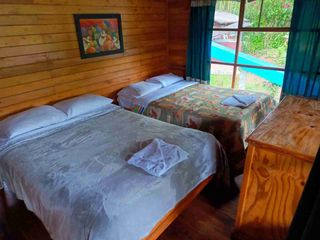 Foto 26 de ✅ RENTA DE CABAÑA DOS DORMITORIOS PARA SEIS PERSONAS CON ÁREA DE DESCANSO (MINDO-ECUADOR)