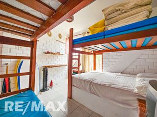 Foto 9 de VENTA DE ACOGEDOR DEPARTAMENTO TIPO BUNGALOW CON TERRAZA, EN CONDOMINIO CERRADO PLAYA LOS PULPOS.
