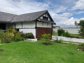 Foto 4 de Venta  2000 m2 Terreno con casa y departamento sector Pifo