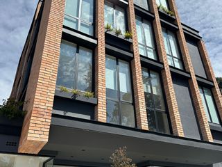 Foto 3 de Local comercial en venta en la Avenida Loja y Av. 1 de Mayo en edificio nuevo en Cuenca
