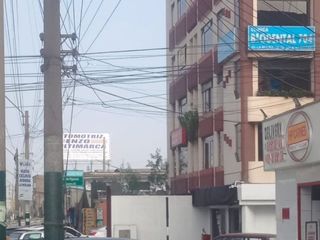 Foto 2 de EDIFICIO DE OFICINAS EN AV LA MOLINA CUADRA SIETE