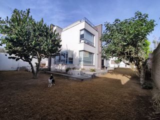 Venta Terreno urbano con dos casas unifamiliares en Pomásqui x Colegio Francés, construcción 415M2, terreno 1000M2, $315.000