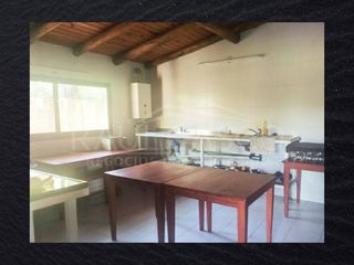 LOTE DE 8.4 HECTÁREAS CON IMPORTANTE VIVIENDA EN VILLA CARLOS PAZ