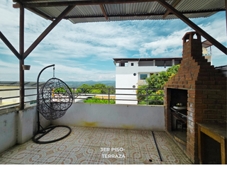 Foto 16 de Esta casa de 2 pisos con oficina, terraza y cochera ofrece el espacio y la comodidad perfecta para una vida próspera en Tarapoto. 😉